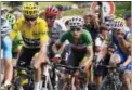  ?? BERNARD PAPON PHOTO VIA AP ?? Britain’s Chris Froome, wearing the overall leader’s yellow jersey, and Italy’s Fabio Aru, second right, climb during the 15th stage of the Tour de France cycling race Sunday.