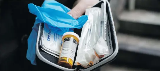  ?? JONATHAN HAYWARD/THE CANADIAN PRESS ?? A naloxone kit, available at pharmacies, can be the difference between life and death when someone suffers an opioid overdose.