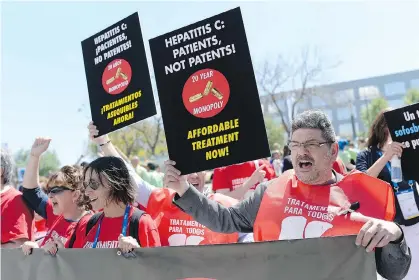  ?? JOSEP LAGOJOSEP LAGO/AFP/GETTY IMAGES ?? While the cost of hepatitis C treatments have caused concerns over strained health care budgets, an advocate says by targeting the sickest patients first, pressures on the B.C.’s Pharmacare system can be managed.