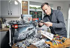  ??  ?? New build: Nick Harding immerses himself in the world of the adult fan of Lego