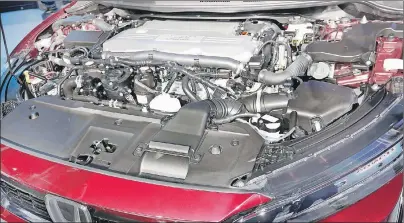  ?? ASSOCIATED PRESS ?? The fuel cell engine of the Honda Clarity is shown during a media preview at the New York Internatio­nal Auto Show, at the Jacob Javits Center in New York, April 12.