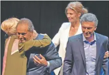  ?? CEDOC PERFIL ?? abrazo al terminar el debate con Macri.