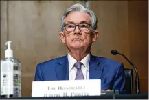  ?? SUSAN WALSH / AP ?? Federal Reserve Chairman Jerome Powell said the Fed will provide support the economy “needs for as long as it takes.”