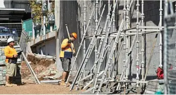  ??  ?? NEW LIFE: Repair works have started on the exterior of Quest Apartments Toowoomba on Margaret St. PHOTO: NEV MADSEN