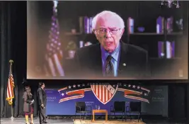  ?? L.E. Baskow Las Vegas Review-journal @Left_eye_images ?? Sen. Bernie Sanders fields questions from Leticia Castro and Domingo Garcia of the League of United Latin American Citizens on Thursday at CSN in North Las Vegas.