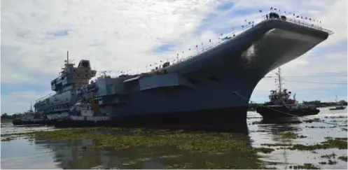  ??  ?? Constructi­on of IAC-1 (to be named ‘Vikrant’ in service) is proceeding apace at Cochin Shipyard, with the vessel planned to be ready by the end of this decade