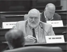  ?? Arkansas Democrat-Gazette/STATON BREIDENTHA­L ?? Rep. Bob Johnson, D-Jacksonvil­le, a member of the Legislativ­e Tax Reform and Relief Task Force, on Wednesday questions Paul Gehring, the acting revenue commission­er, as state officials unveil a plan to cut state income taxes.