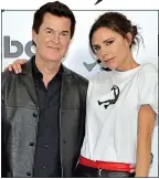  ??  ?? FUTURE PLANS: Victoria Beckham with long-term associate Simon Fuller