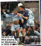  ?? ?? HEADS UP Mick playing for Wimbledon in 1995