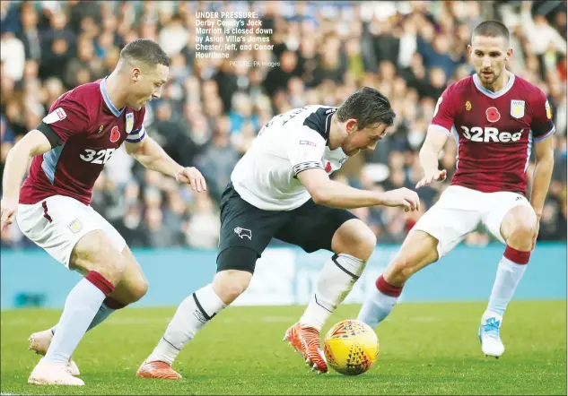  ?? PICTURE: PA Images ?? UNDER PRESSURE: Derby County’s Jack Marriott is closed down by Aston Villa’s James Chester, left, and Conor Hourihane