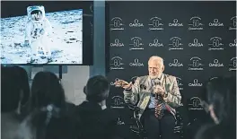  ??  ?? Buzz Aldrin and a famous picture of himself that people routinely mistake for one of Neil Armstrong.