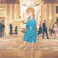  ??  ?? In her ‘Delicate’ music video, Swift dances and dances, through the hotel lobby, on the concierge’s desk, in an elevator, through an empty room, and outside in the pouring rain, where she jumps on a car. She truly dances like no one is watching.