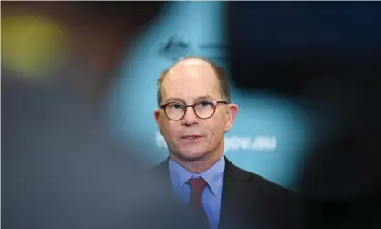  ?? Photograph: Lukas Coch/AAP ?? Chief medical officer Paul Kelly says Australia’s vaccinatio­n program will not get internatio­nal travel back to normal straight away.