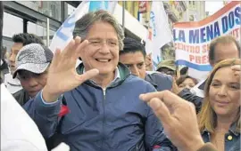  ?? Rodrigo Buendia AFP/Getty Images ?? CANDIDATE Guillermo Lasso wants Assange out for economic reasons. “The Ecuadorean people are paying costs that it shouldn’ tha ve to,” he said.