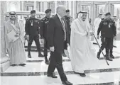  ?? MANDEL NGAN, AFP/GETTY IMAGES ?? President Trump and Saudi Arabia’s King Salman bin Abdulaziz al-Saud arrive for the Arabic Islamic American Summit at Riyadh’s King Abdulaziz Conference Center.