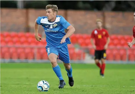  ?? Photo: Kevin Farmer ?? IN THE NET: South West Queensland Thunder striker Chris Hatfield scored in his side’s 2-1 loss to Cairns at the weekend.