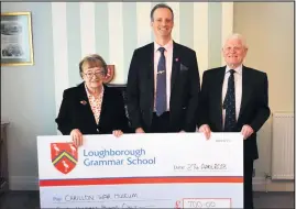  ??  ?? Pictured, left to right: Marigold Cleeve, of the Carillon War Memorial Museum, Loughborou­gh Grammar School headmaster Duncan Byrne, and Mel Gould, chairman of the museum.