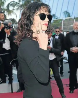  ??  ?? Asia Argento, who looks like she’s giving someone the middle finger.