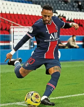  ?? — AP ?? Focused: Paris St Germain’s Neymar taking a corner kick during the Ligue 1 match against Angers at the Parc des Princes.