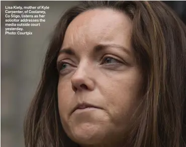  ?? Photo: Courtpix ?? Lisa Kiely, mother of Kyle Carpenter, of Coolaney, Co Sligo, listens as her solicitor addresses the media outside court yesterday.