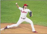  ?? MATT SLOCUM - ASSOCIATED PRESS ?? The Phillies’ Aaron Nola delivers during the first inning Tuesday night against the Nationals. Nola threw eight shutout innings in a 6-0 Phillies win.