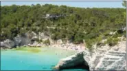  ?? PHOTOS BY ALBERT STUMM VIA AP ?? Another view of Cala Mitjana bay on the island of Menorca, Spain.