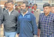  ?? PARVEEN KUMAR/HT PHOTO ?? Mahipal Singh (C) is taken out of the district sessions court after n the verdict, in Gurugram, on Friday.