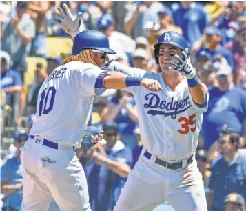  ?? ROBERT HANASHIRO, USA TODAY SPORTS ?? Justin Turner, Cody Bellinger, right, and the Dodgers are on an impressive home run binge.