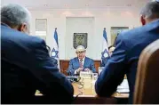  ?? [AP PHOTO] ?? Israeli Prime Minister Benjamin Netanyahu, center, attends the weekly cabinet meeting Sunday at the Prime Minister’s office in Jerusalem.