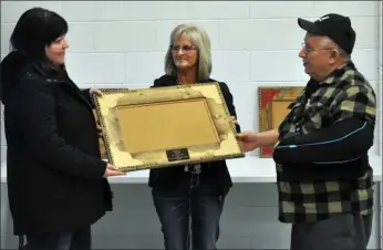  ?? Photo by Matthew Liebenberg ?? The Ag & Ex made a presentati­on to Jenn Duncan for serving on the board from 2013-19. Pictured, from left to right, Jenn Duncan, Tracey Stevenson (office manager), and Jack Anning (2019 board president).