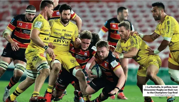  ?? David Rogers/Getty Images ?? > La Rochelle, in yellow, beat Gloucester Rugby on their run to the Champions Cup final