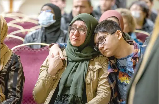  ?? ?? Mourners attend an interfaith vigil on Feb. 9 at the Turkish American Society of Chicago in Mount Prospect to pray for earthquake victims in Turkey and Syria.