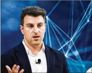  ?? JEENAH MOON / THE NEW YORK TIMES ?? Brian Chesky, the chief executive of Airbnb, speaks at the annual DealBook conference in New York, on Nov. 6.