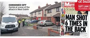  ??  ?? CORDONED-OFF Gardai at scene of the attack in West Dublin