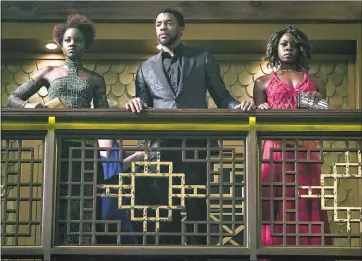  ?? COURTESY OF DISNEY ?? Lupita Nyong’o, left, Chadwick Boseman and Danai Gurira in “Black Panther.”