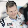  ?? Sean Gardner / Getty Images ?? Dale Earnhardt Jr. said the people around racing are a good tonic for him this week.