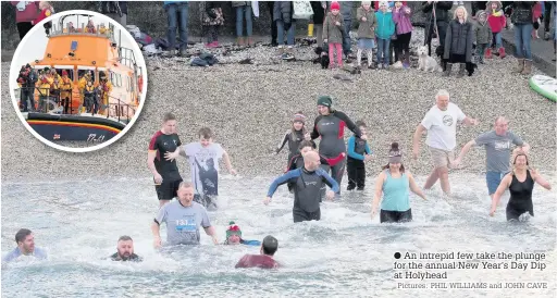  ?? Pictures: PHIL WILLIAMS and JOHN CAVE ?? An intrepid few take the plunge for the annual New Year’s Day Dip at Holyhead