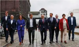  ?? Photograph: Odd Andersen/AFP/Getty Images ?? Germany’s new chancellor, Olaf Scholz, centre, flanked by SPD, Green and FDP leaders after the final coalition talks in Berlin.