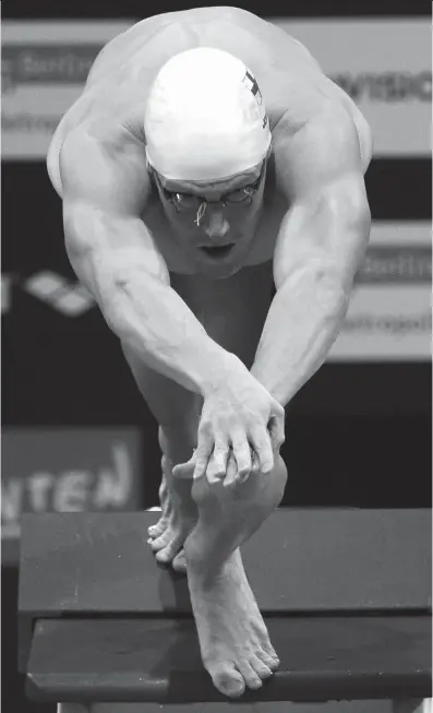  ?? Photo: VCG ?? Faroe Islands’ Pal Joensen takes the start of the men’s 800 meters freestyle final of the European Swimming Championsh­ips on August 22, 2014 in Berlin, Germany.