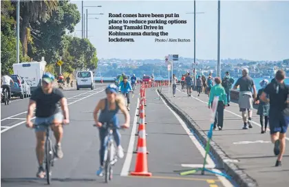  ?? Photo / Alex Burton ?? Road cones have been put in place to reduce parking options along Tamaki Drive in Kohimarama during the lockdown.