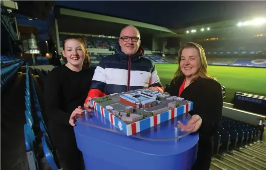  ??  ?? Russell Sneddon was joined by his daughter Amelia and fiancee Gabrielle Watson to collect his prize, designed by David Resnik, inset, at Ibrox Stadium