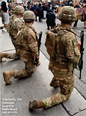  ??  ?? Solidarity: The National Guard in Hollywood last month