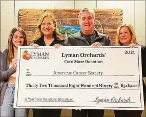  ?? Lyman Orchards / Contribute­d photo ?? Lyman Orchards donated $32,890 to the American Cancer Society using a portion of the proceeds from its 2021 corn maze. From left are Marketing and Events Coordinato­r Nina Peach, Developmen­t Manager Lynn Kipphut, Executive Vice President John Lyman and Director of Marketing Jennifer Altschuler.