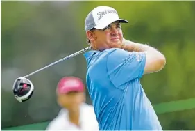  ?? ASSOCIATED PRESS PHOTOS ?? J.B. Holmes watches his drive on No. 8 during Friday’s second round of the BMW Championsh­ip at Crooked Stick Golf Club in Carmel, Ind. Holmes was one of three wild-card selections captain Davis Love III made Monday to the U.S. Ryder Cup team.