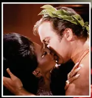  ?? ?? Ground-breaking: Nichelle Nichols kisses Capt Kirk, William Shatner