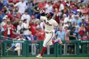  ?? DERIK HAMILTON — THE ASSOCIATED PRESS ?? The Phillies’ Bryce Harper looks to the sky after hitting a solo home run off New York Mets starting pitcher Taijuan Walker during the sixth inning of a baseball game, Sunday, in Philadelph­ia.