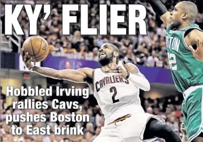  ?? Getty Images ?? GAME 4 SCORE: Kyrie Irving, who scored a game-high 42 points, drives around the Celtics’ Al Horford during the Cavaliers’ 112-99 win in Game 4 of the NBA’s Eastern Conference finals.