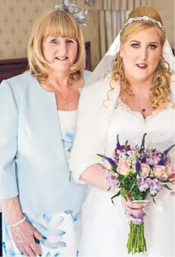  ??  ?? Emma with mum Judy on her wedding day but her dad had already passed away