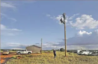  ?? Jake Bacon Associated Press ?? A POWER POLE on the Navajo Nation. Indigenous people are often excluded from health data.
