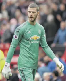  ?? (Photo: AFP) ?? Manchester United’s Spanish goalkeeper David de Gea leaves the pitch at half-time during the English Premier League match against Chelsea at Old Trafford in Manchester, north-west England, recently.